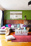 green living room, lounge, interior, home decorating ideas, brick fireplace, painted feature wall 