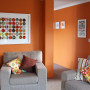 lounge, living room, orange lounge, orange living room, bright living room, orange paint
