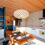 holiday cabin, kitchen, dining room, timber ceiling, feature wall