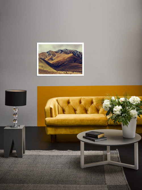 lounge, living room, gold couch, geometric feature wall, gold feature wall, grey lounge