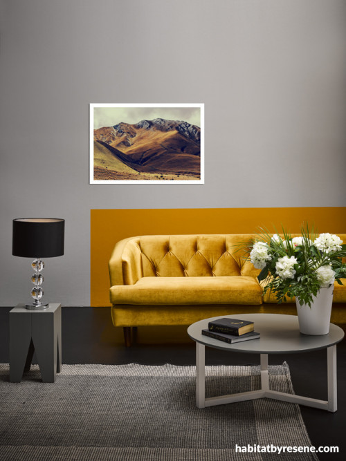 lounge, living room, gold couch, geometric feature wall, gold feature wall, grey lounge