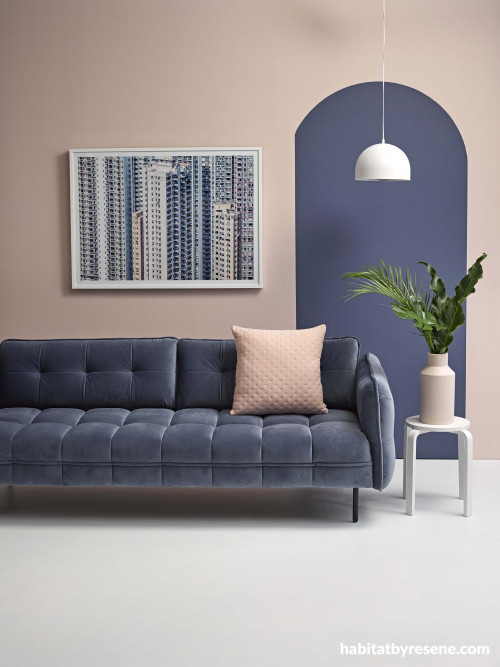 lounge, living room, painted feature wall, pink lounge, blue couch, blue and pink