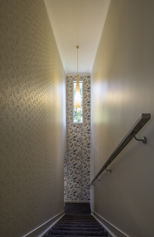 1970s house, paint ideas,  paint trends, stairwell, stairs, wall paper