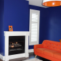 lounge, family room, dark blue, navy blue, orange couch