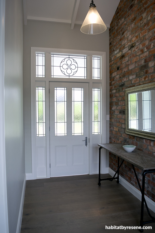 entrance, hallway, neutrals, feature wall, front door