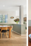 A balance between warm and cool brought this coastal charmer to life