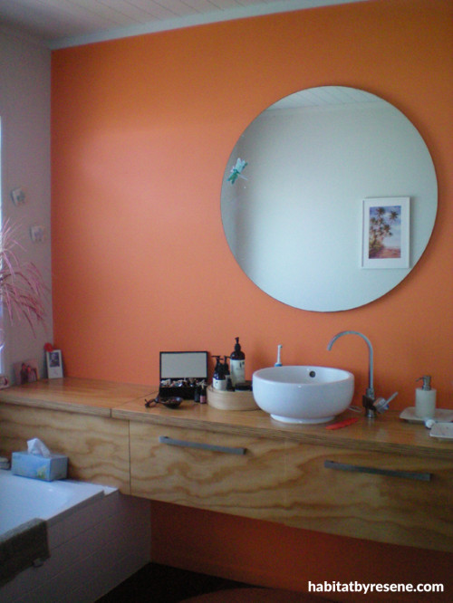 bach, holiday home, beach house, bathroom, orange bathroom, orange feature wall, bright bathroom