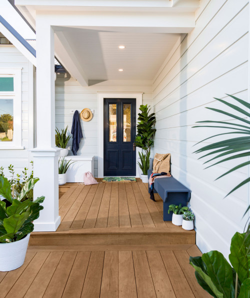 entranceway, front porch, house exterior, white house, white exterior, blue front door