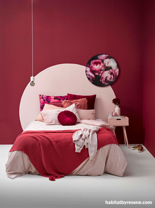 bedroom, red bedroom, red and pink bedroom, red feature wall, circle painted bedhead 