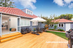 house exterior, painted weatherboards, outdoor living area, deck, grey house, grey exterior
