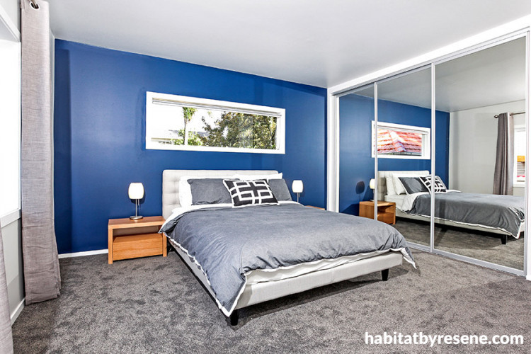 blue bedroom, feature wall, master bedroom, grey and blue, grey carpet, blue paint