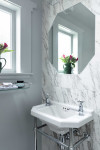 What a transformation! Elegant Resene silver greys and blues take this 1930s Takapuna home from tired to triumph