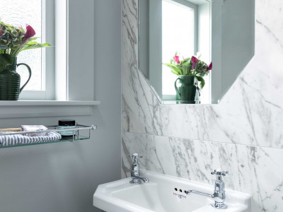 What a transformation! Elegant Resene silver greys and blues take this 1930s Takapuna home from tired to triumph