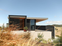 Paul and Brett bring minimal and modern magic to this Mangawhai beach-farm property