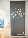 accent wall, hallway decor, grey wall, mounted art, Resene 