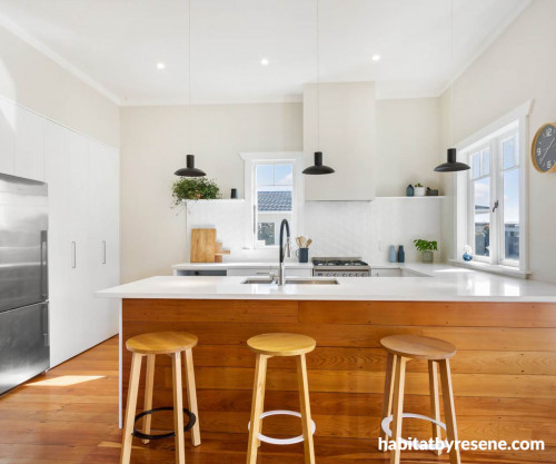 White kitchen wooden island