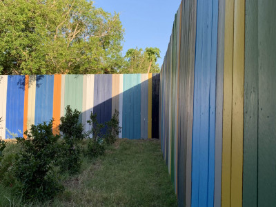 This artist’s Brisbane home is so colourful even the 85m fence is an elegant rainbow This artist’s Brisbane home is so colourful even the 85m fence is an elegant rainbow