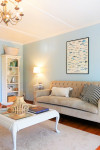 Beachside cottage bought online on an impulse receives a contemporary coastal refresh while retaining original bach style