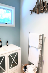 Beachside cottage bought online on an impulse receives a contemporary coastal refresh while retaining original bach style